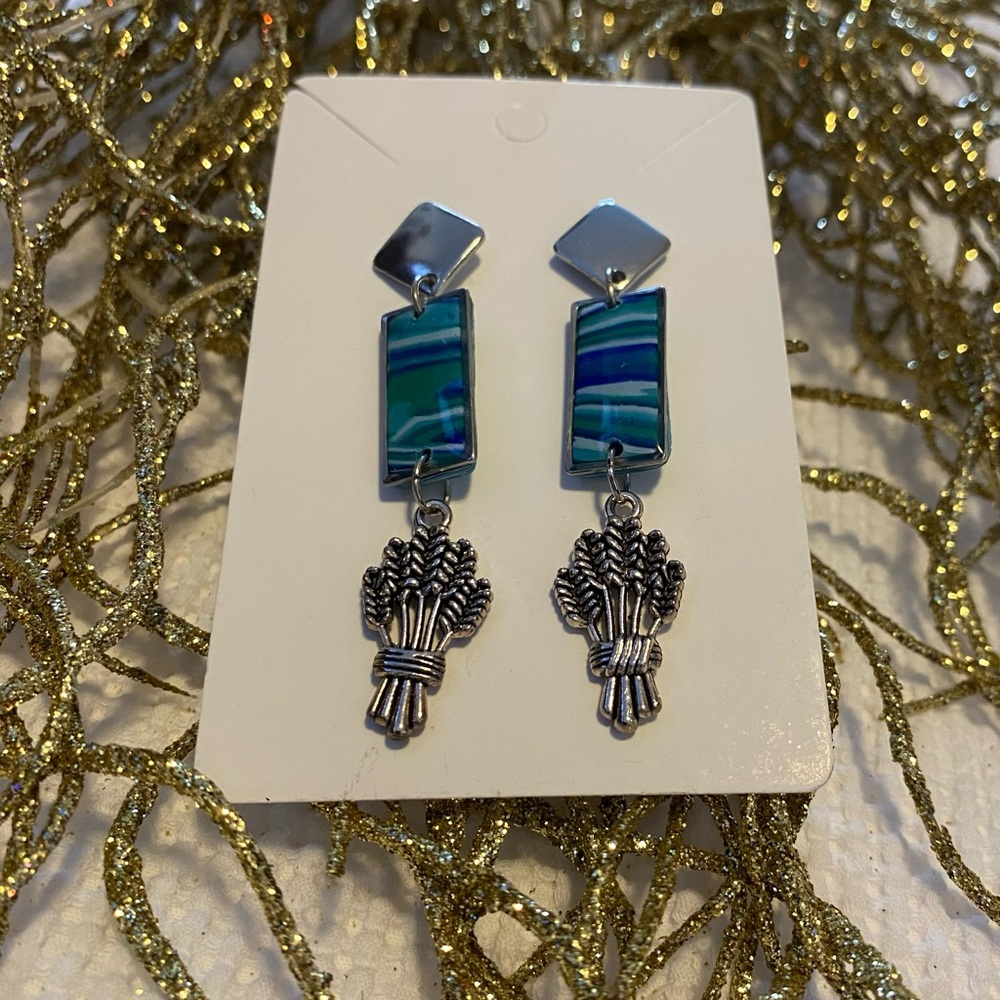 Silver and Blue Multi-Tiered Earrings with Intricate Metalwork